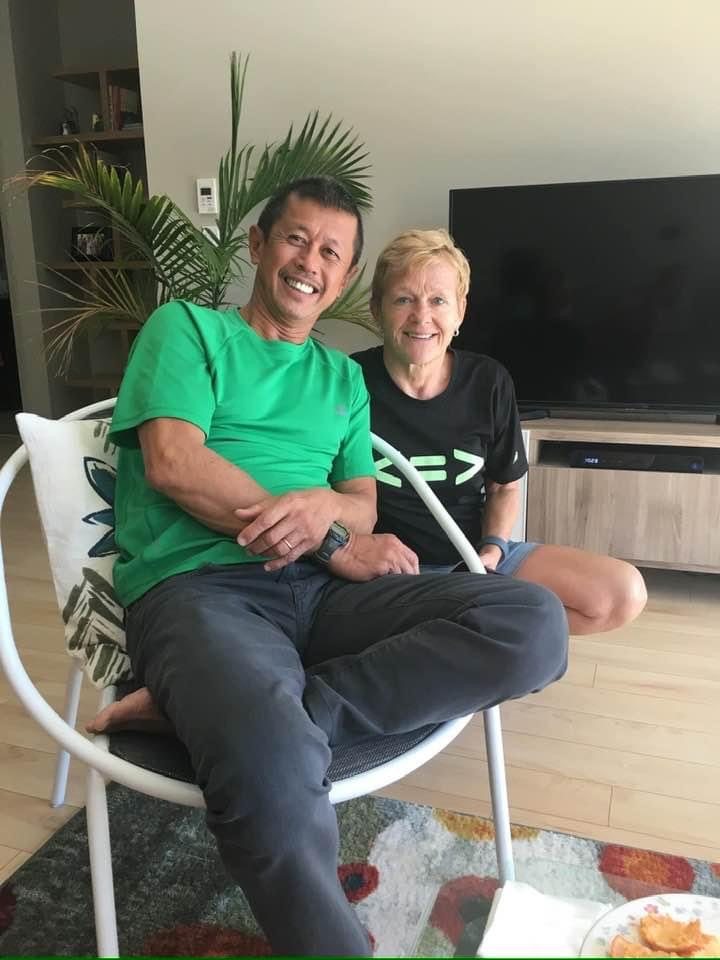 Alan and Susie smiling together at home